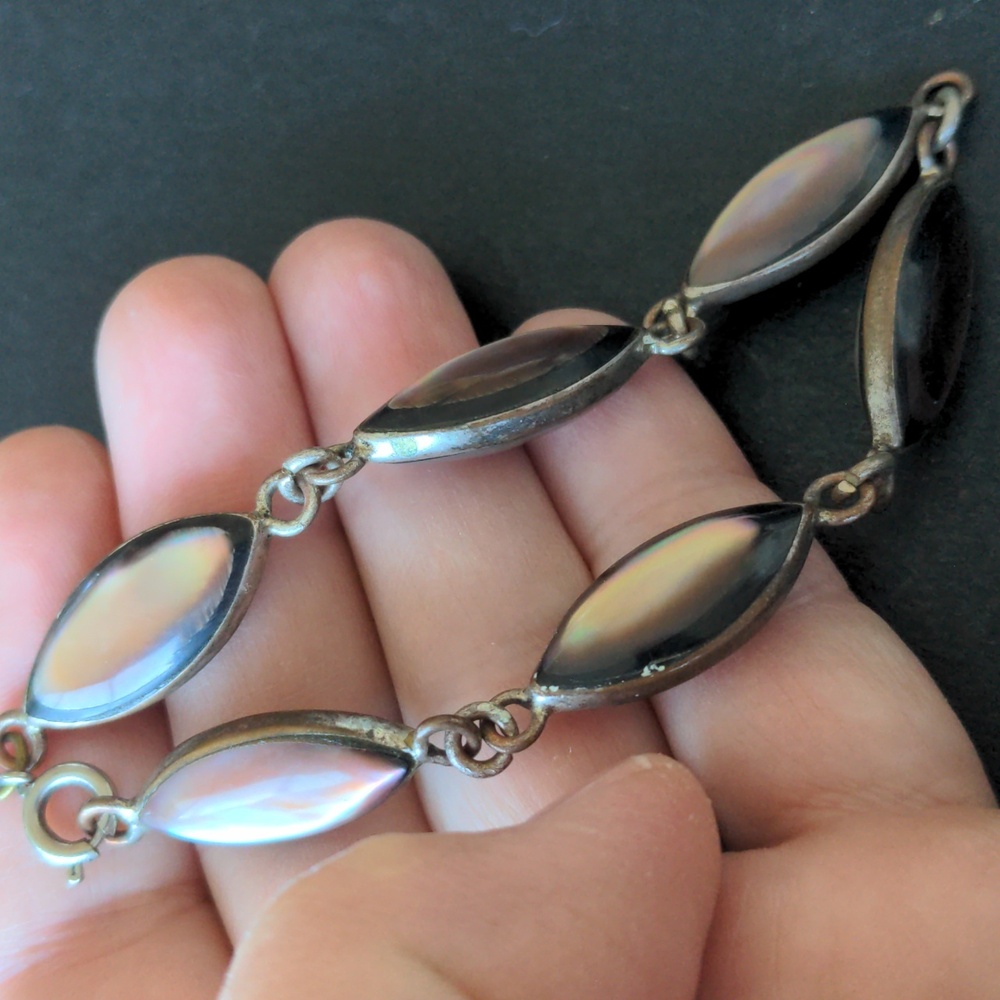 Vintage handmade bracelet w opal like glowing mother of pearl links, 8"